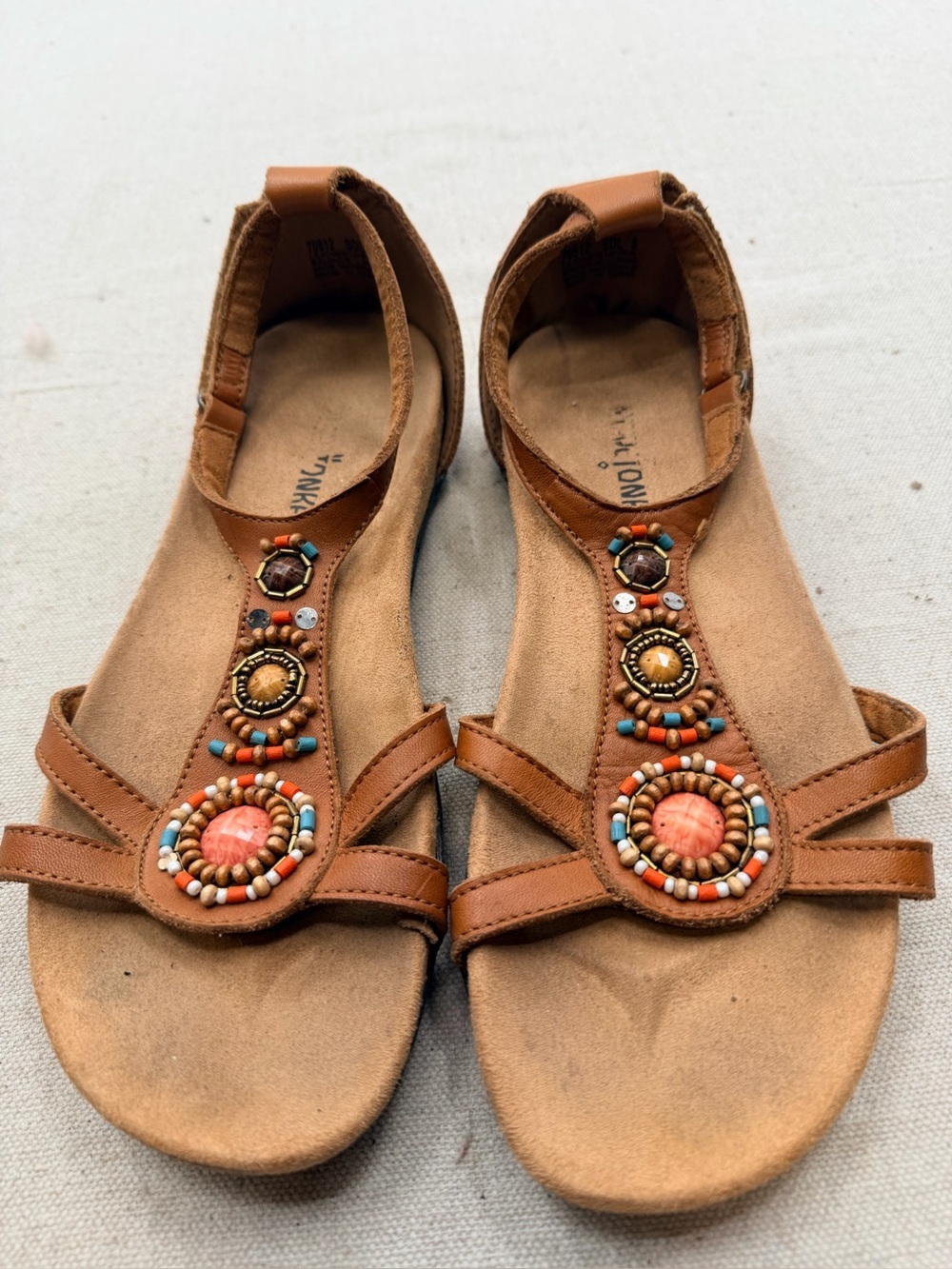Minnetonka Women's Tan Beaded T-Strap Sandals